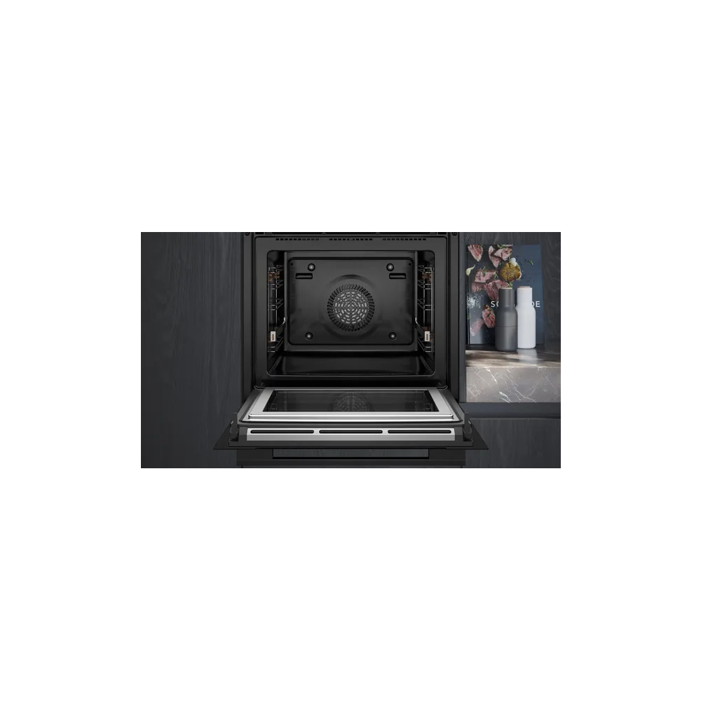 Four combiné raffiné avec micro-ondes intégré Siemens HM776GKB1 iQ700 Noir 60 x 60 cm pour des cuisines classes et stylées.