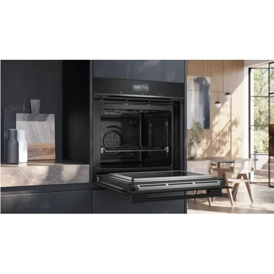 Four combiné raffiné avec micro-ondes intégré Siemens HM776GKB1 iQ700 Noir 60 x 60 cm pour des cuisines classes et stylées.