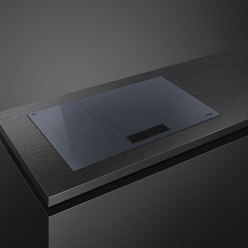 "Piano di cottura a induzione Smeg in vetroceramica grigio Neptune"