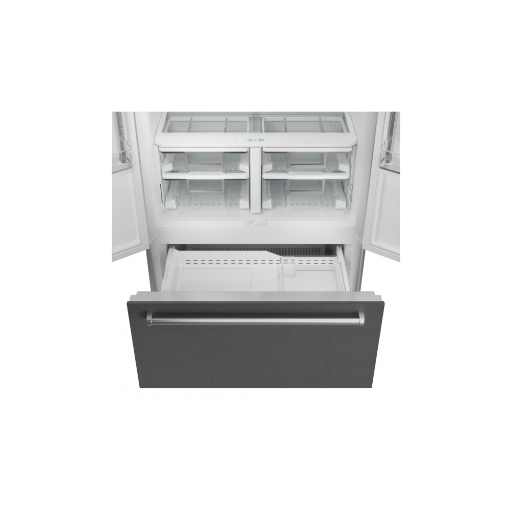 Sub-Zero Refrigerator with Ice Maker and Interior Water Dispenser.