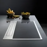 Falmec Sintesi inox: das Induktionskochfeld mit integrierter Dunstabzugshaube, das Stil und Funktionalität vereint