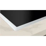 Entdecken Sie das Neff FlexInduction Zone Light Induktionskochfeld mit TwistPad mit Edelstahlrahmen