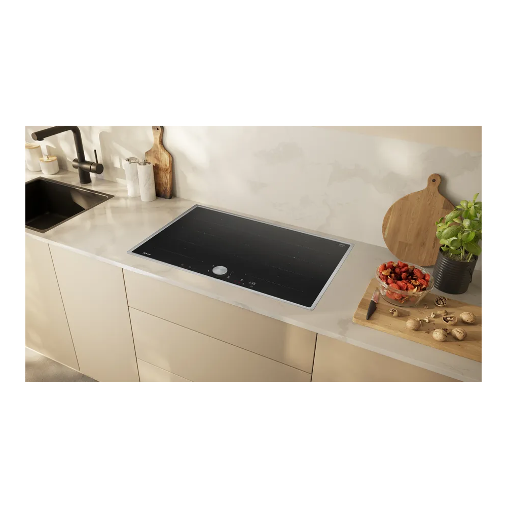 Scopri il Pianocottura a Induzione Neff FlexInduction Zone Light con TwistPad con cornice inox T68STY4L0