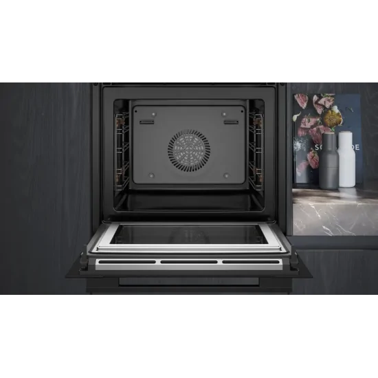 Scopri il nuovo iQ700: Forno combinato con microonde da incasso 60 x 60 cm Nero HM736G1B1 di Siemens - Perfetto per cucinare in