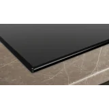 Luxuriöse Leistung und Eleganz mit dem 80-cm-Induktionskochfeld ED877HSC1E iQ500 in Schwarz mit Edelstahlprofil