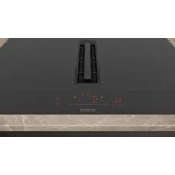 Perfekte Kombination aus Eleganz und Funktionalität: die Induktionsebene mit integrierter Belüftung von 70 cm signiert Siemens.